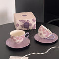 Floral ceramic tea cup and saucer set with matching gift box, delicate purple flowers and butterflies design